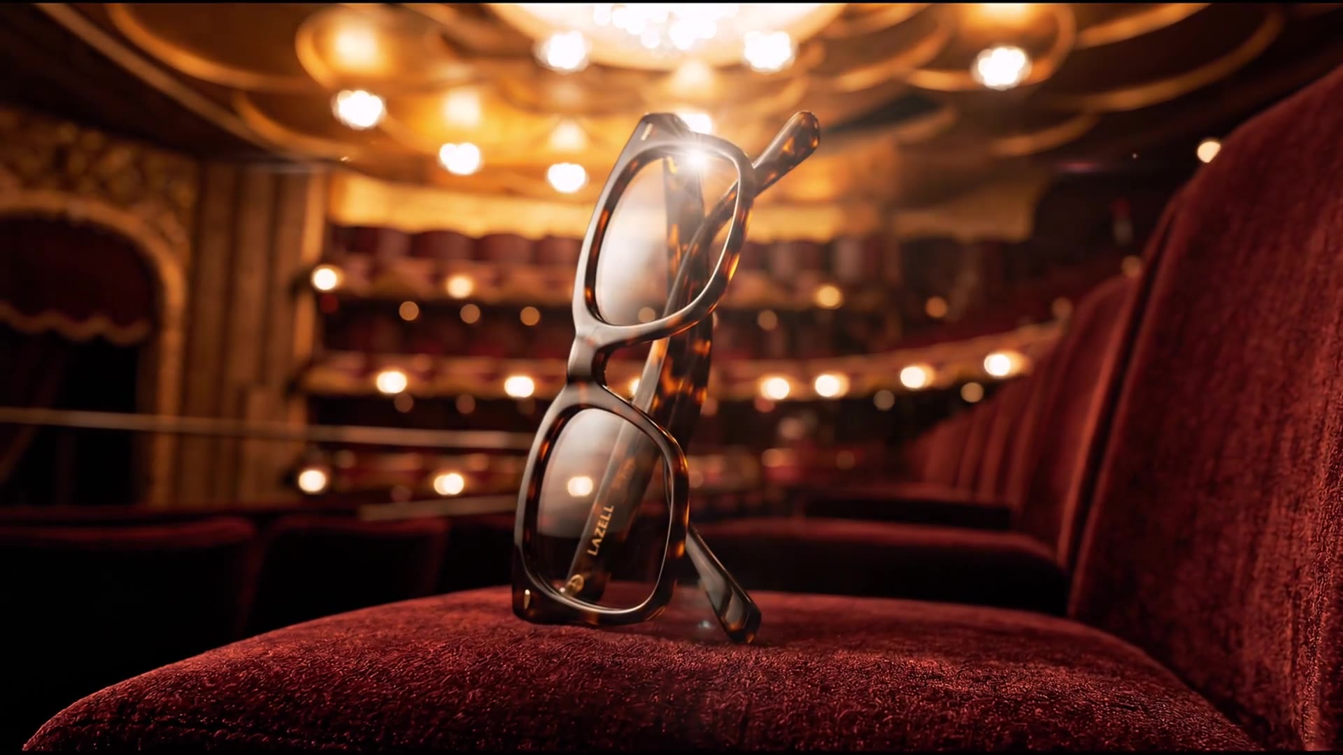 A Lazell frame resting on red velvet at the opera house